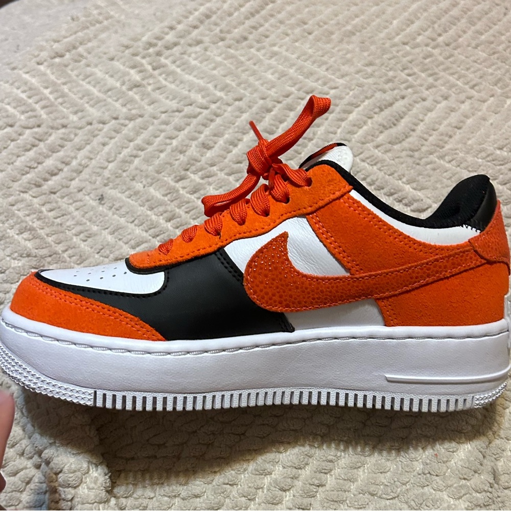 Black and orange Air Force ones